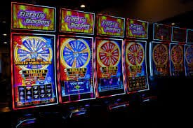 Filipino player spinning online slot games on a mobile phone at ph365 casino